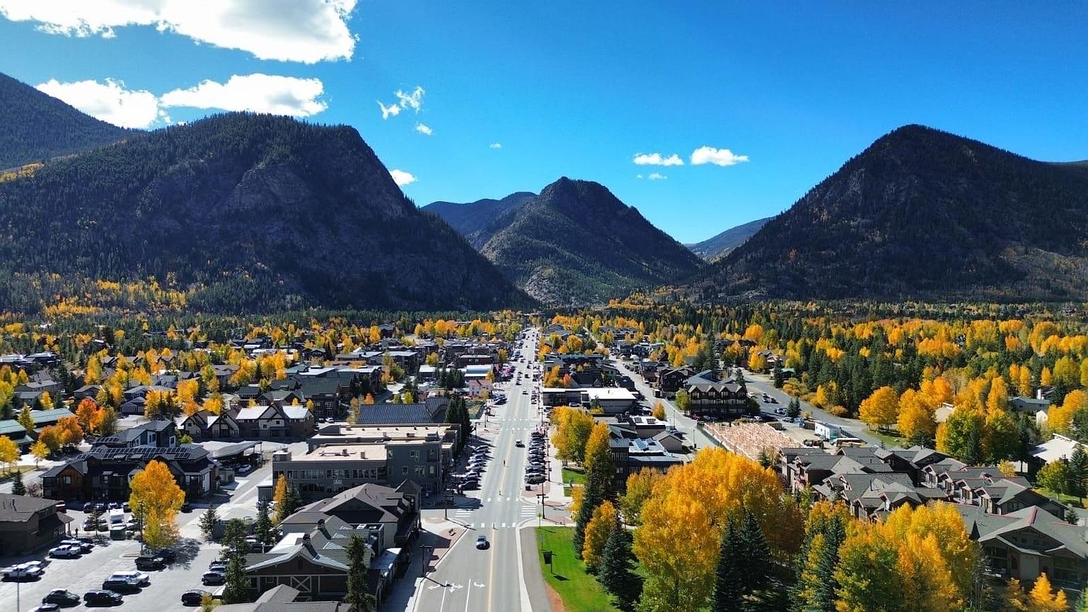 Aerial view of Frisco Main Street and the Tenmile Range in autumn, golden aspens lining the streets, the property sits just off this corridor